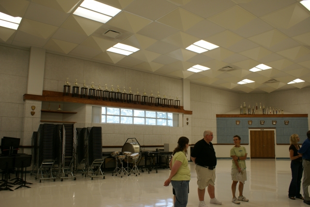 Wayne Sharum and Katherine Staton in the new band room.  Notice all the trophies.  One of the winningest bands in the state. 